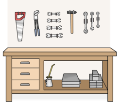 Leichte Sprache: Eine Werk-Bank mit verschiedenen Werkzeugen. An der Wand darüber hängen noch mehr Werkzeuge.
